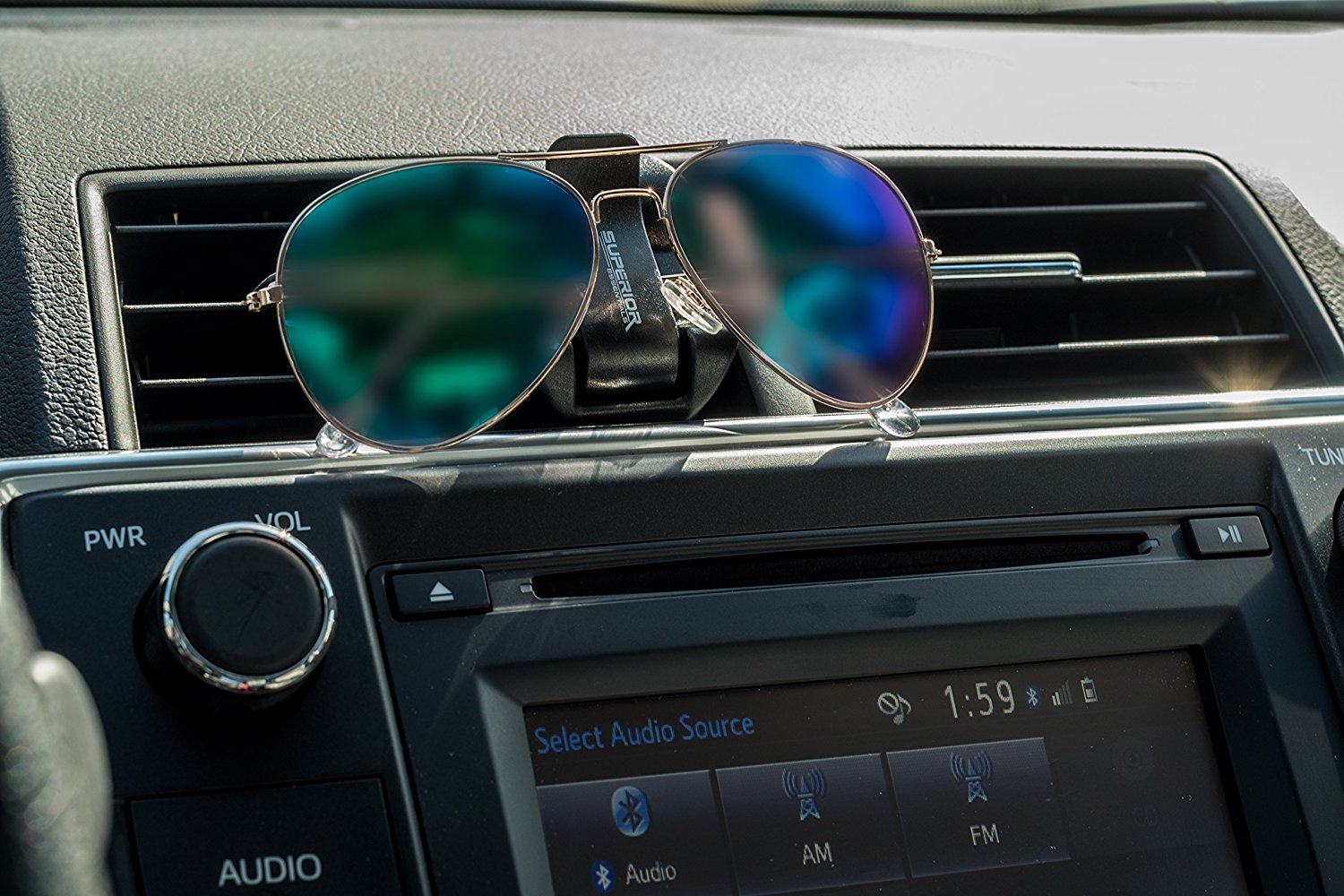 Superior Essentials Sunglasses Holder for Sun Visor/Air Vent - Conveniently Holds Sunglasses - Easy One Handed Operation